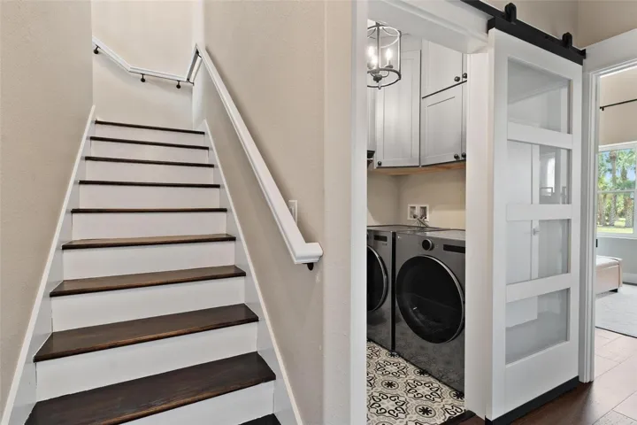 Stair leading to loft area upstairs.