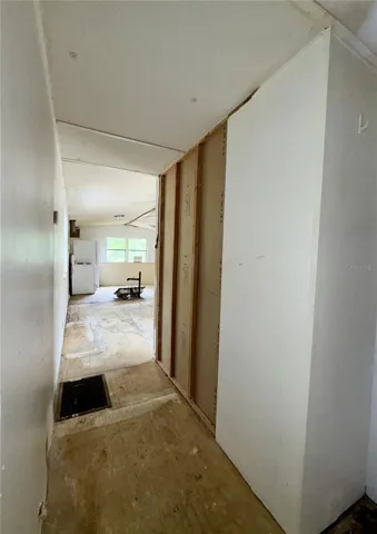 Looking down the hallway back towards the living room and kitchen