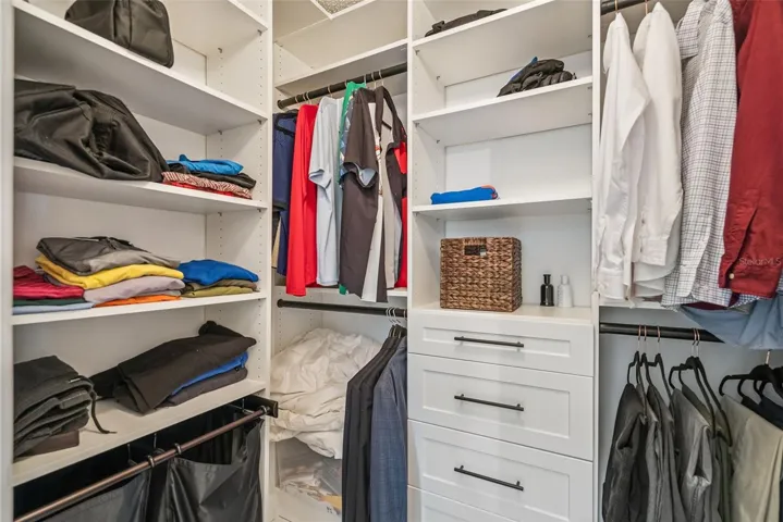 First closet in primary suite.