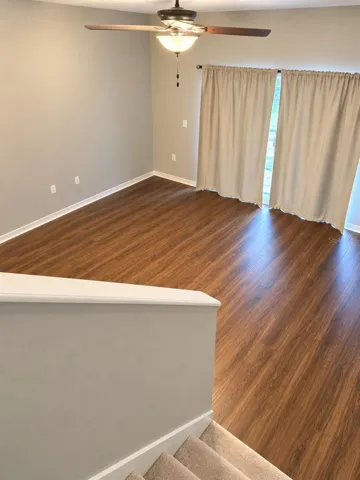 View of Living Room Space From Stairs