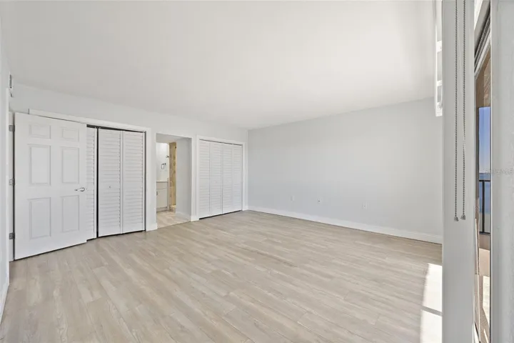 Primary Bedroom with Dual Closets and En Suite Bathroom