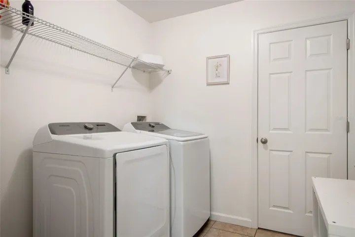 Upstairs Walk In Laundry Room with Extra Closet