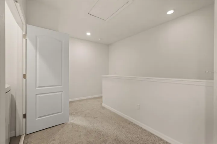 Loft landing with view to laundry closet
