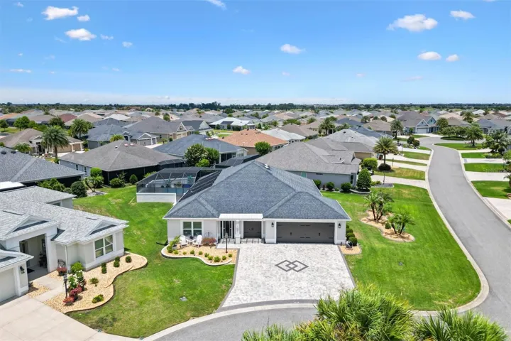 3 BEDROOM 3 BATH WITH A GOLF CART GARAGE + A 30 x 12.4 GLASS ENCLOSED LANAI (NOT INCLUDED IN THE SQ FOOTAGE) UNDER HEAT/AIR. BOND IS PAID IN FULL