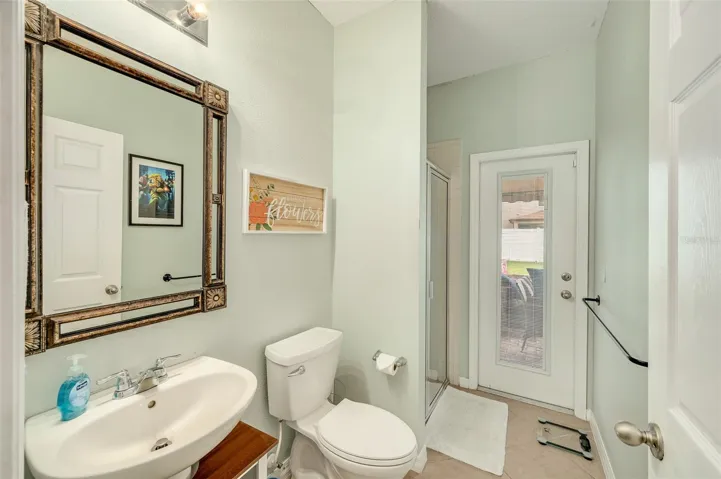 Full bathroom w/ shower and exterior access