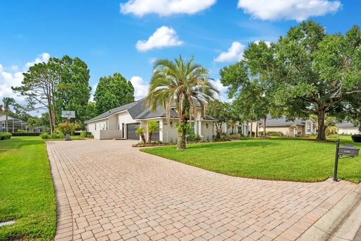 3 car garage and paver driveway