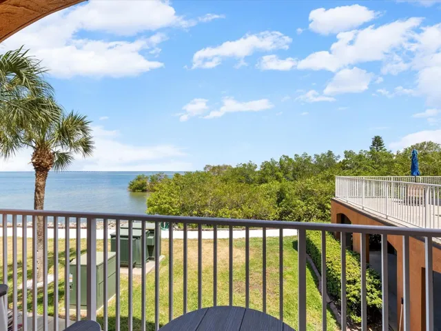Balcony view, with large sundeck just steps away from front door.