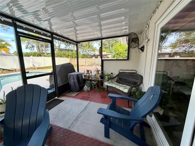 Oversized patio with sliders from the family room