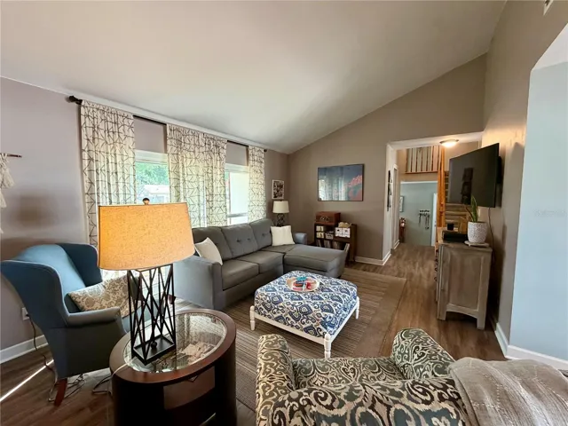 Formal living room at the front of the home is bright and open