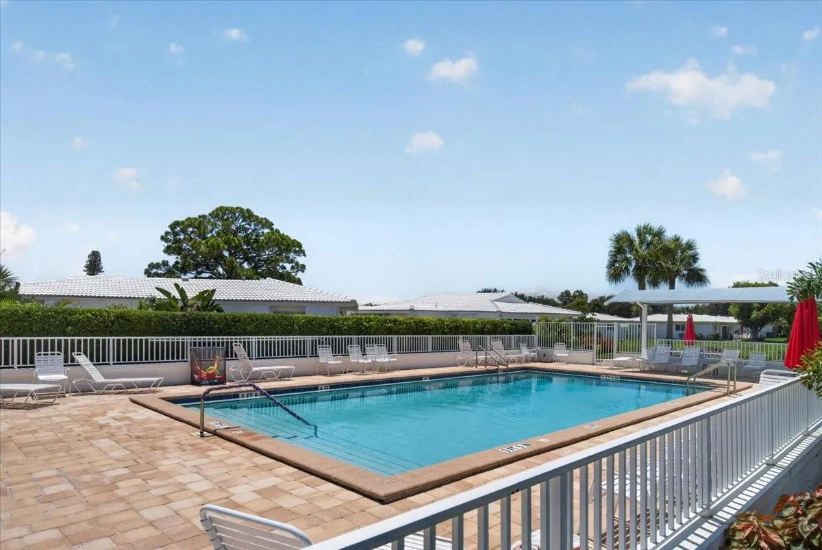 Community Pool steps away from this Residence