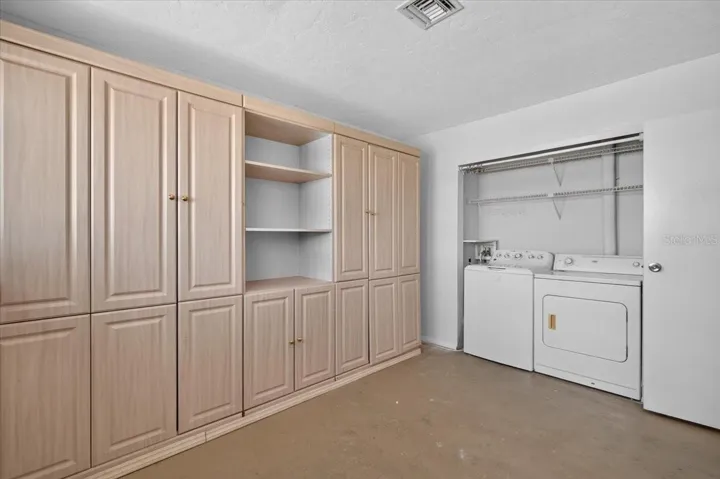 Laundry in 3rd Bedroom with Murphy Bed included.