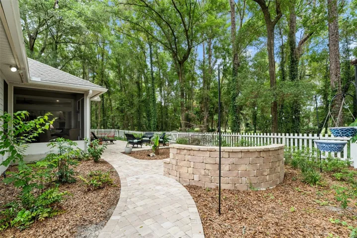 Pathway from driveway to firepit and back patio