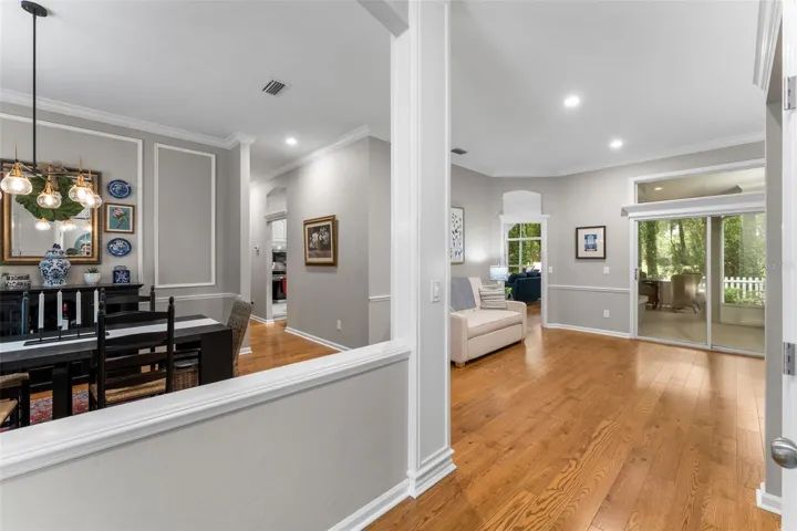 Walking into formal living and dining areas