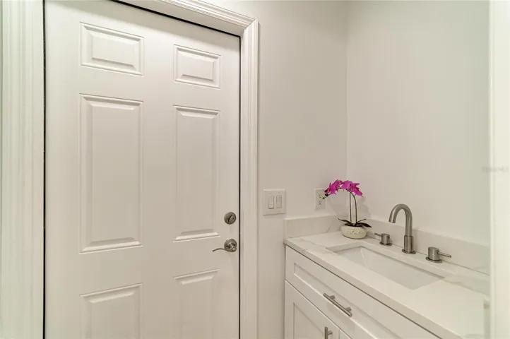 Primary Bathroom with door to lanai &amp; pool area