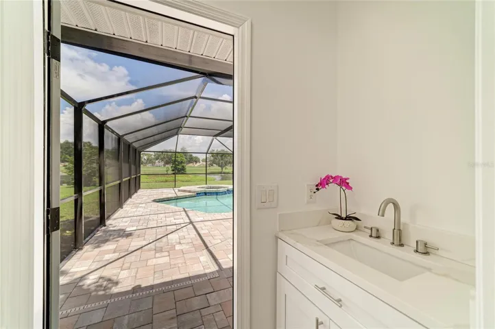 Primary Bathroom with door to lanai &amp; pool area