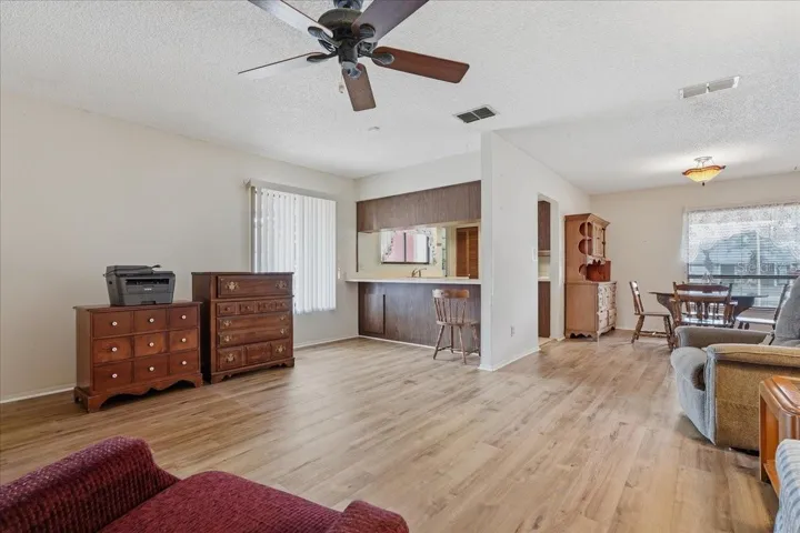 Living Room with View to Dining Room and Kitchen