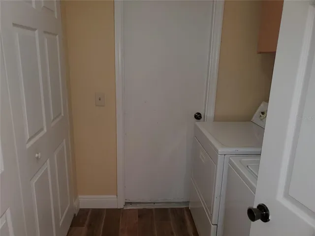Laundry Room with Built in Closet