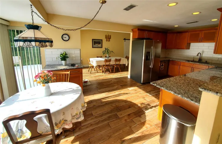 Breakfast / Lunch area off Kitchen with Pool & Golf Course View