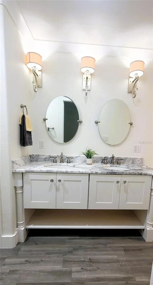 Luxury Primary Bath retreat! Two sinks, big Soaking tub and separate shower with multiple shower heads.