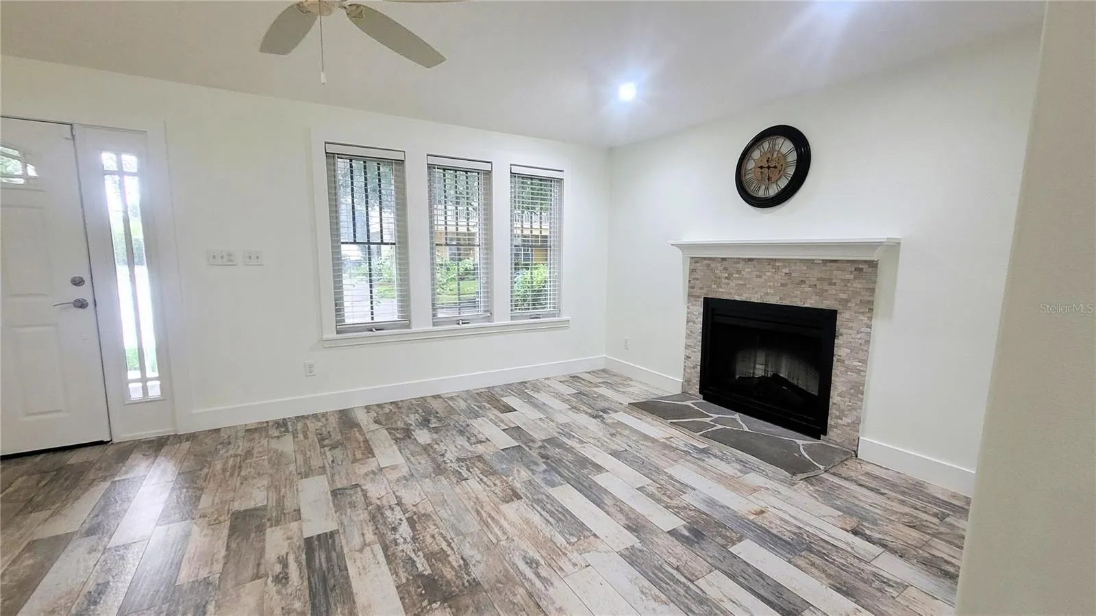 Come on in!! Step into 1920's charm, but MODERN convenience: Tile floors, electric FPL, separate Dining Room, and OH MY! Wait 'til you see the Kitchen!