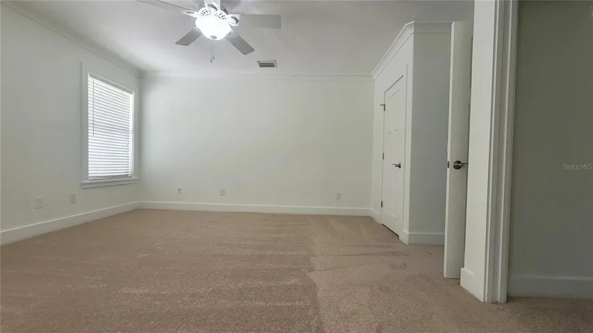 Primary Bedroom, with soft natural light, BRAND NEW CARPET! Roomy double closets