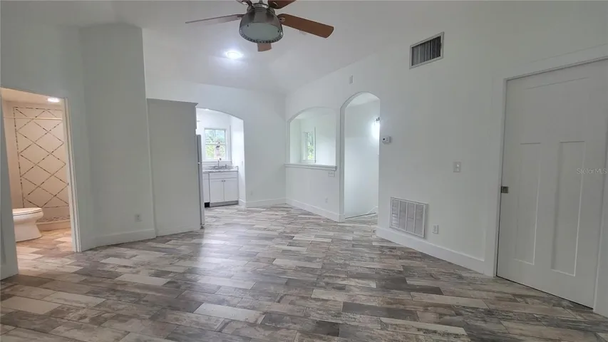 Sweet Home Office or artist's retreat - with full kitchen, big walk-in closet and very roomy full bath. Soaring ceilings, and beautiful soft natural light.