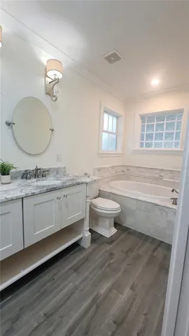 Beautiful garden tub to soak in and relax away the days' worries.