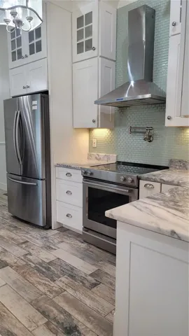 Professional hood system and pot-filler feature over your cooktop makes meal prep &amp; cooking the joy they should be!