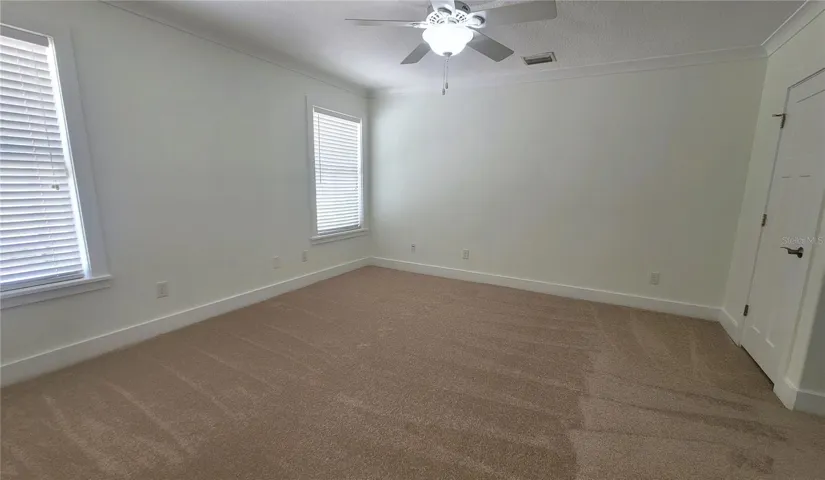 Gracious Primary Bedroom, with plenty of space for your king-sized bed.
