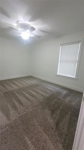 Bedroom Two, with ample room for a queen bed.