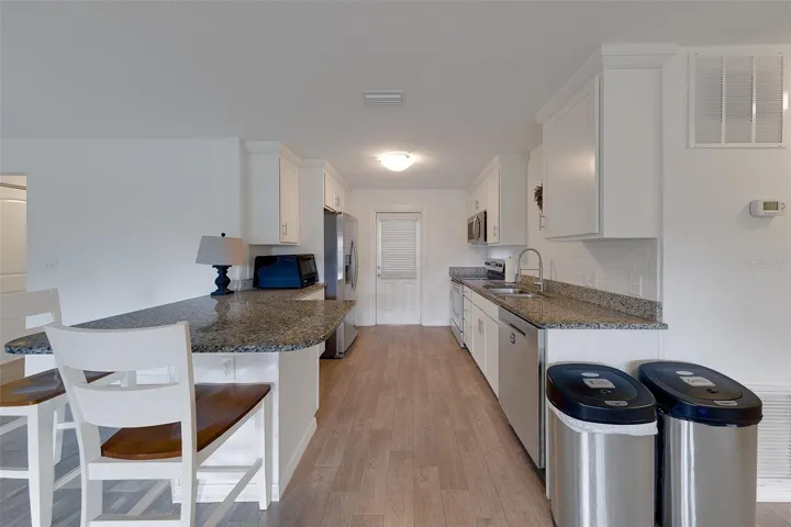 Kitchen leads to outdoor patio