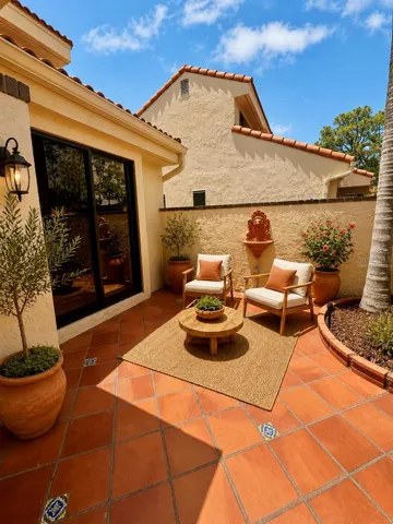 Virtually staged. Front courtyard