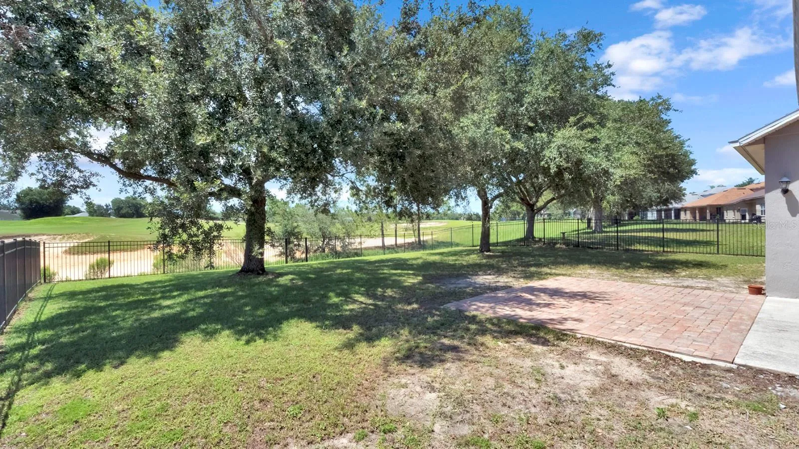 View to the Eagle Dunes Golf Course from the back of the home.