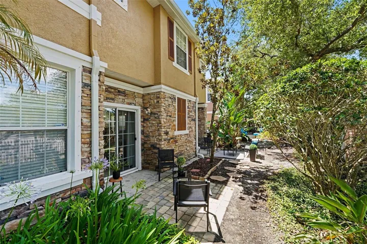 Private double backyard with pavers