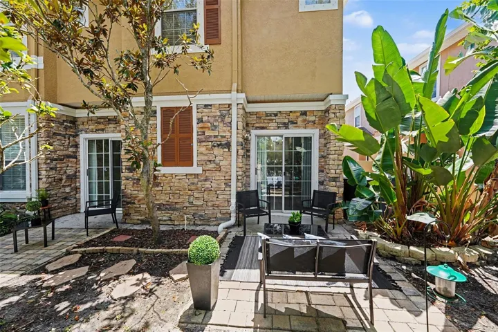 Private double backyard with pavers