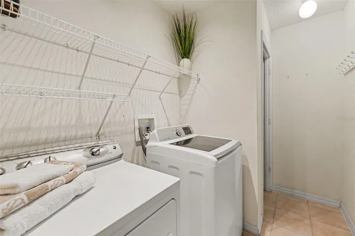 Laundry room with extra closet!