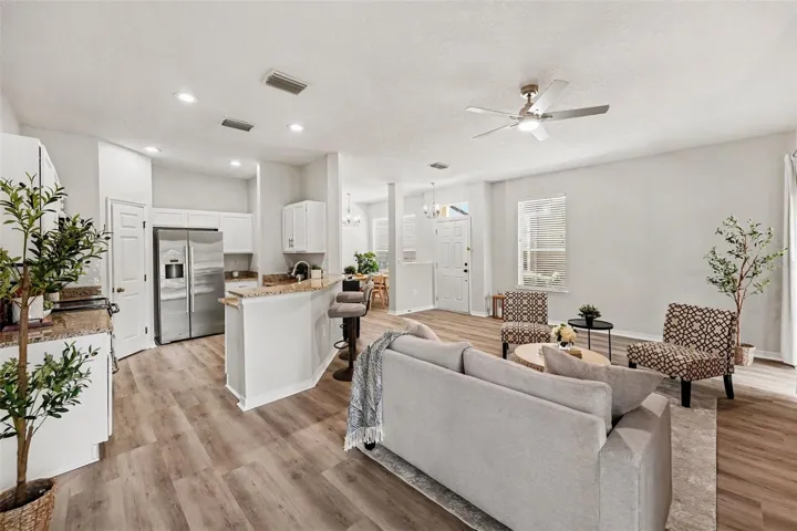 Spacious and bright living room and kitchen.