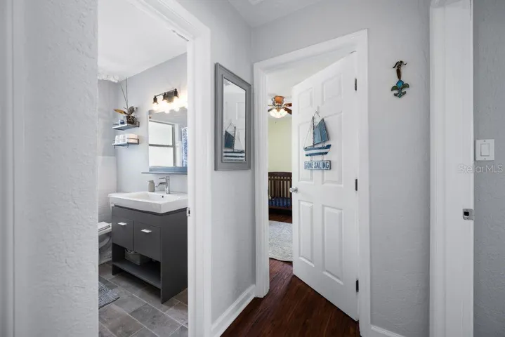 Hall Bath, Secondary Bedroom, Primary Bedroom to Right