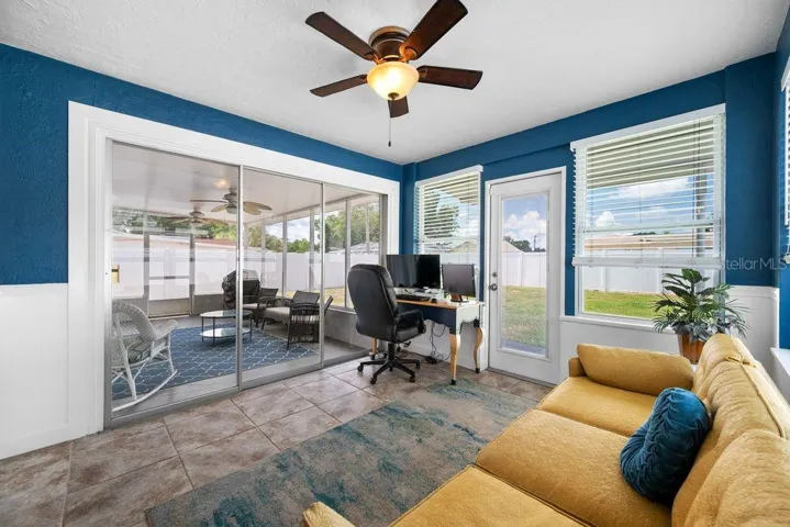 Sliding Glass Door to Covered and Screened Patio