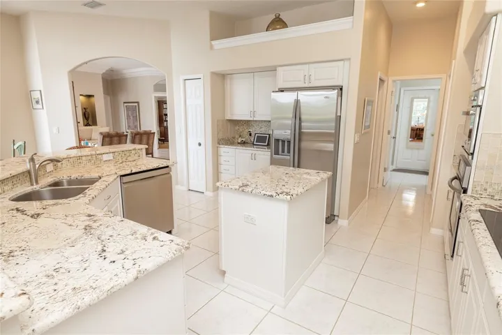 Kitchen layout with laundry and garage access