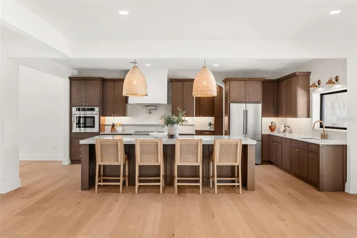 LUXURIOUS CHEF'S KITCHEN SHOWCASING HIGH-END APPLIANCES AND EXCEPTIONAL DESIGN