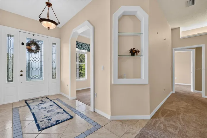 Nice tiled foyer.