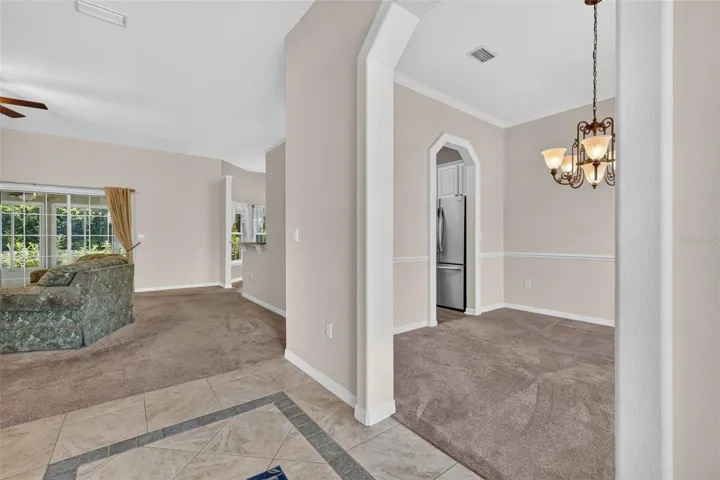 Dining room to the right, with views of the family room.