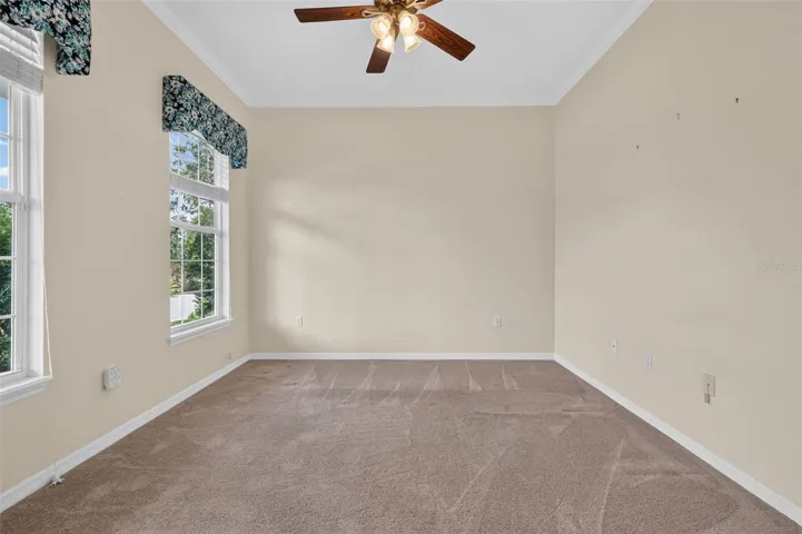 Formal living room with views of Lake Woodward.