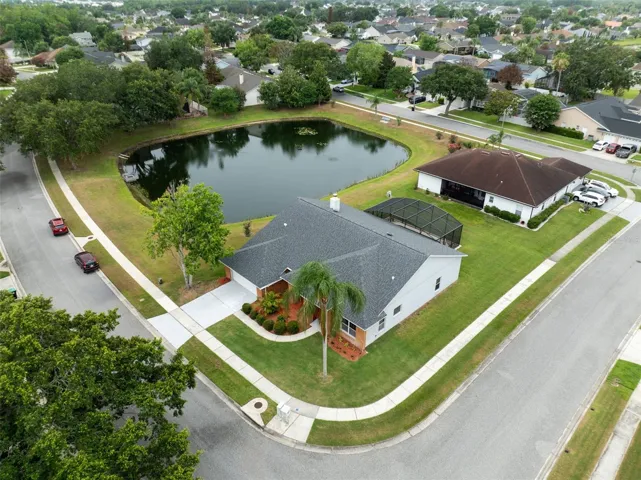 Corner lot with pond, no side neighbors.