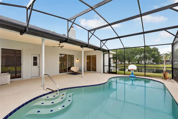 Screened pool & covered lanai, perfect for Florida living.