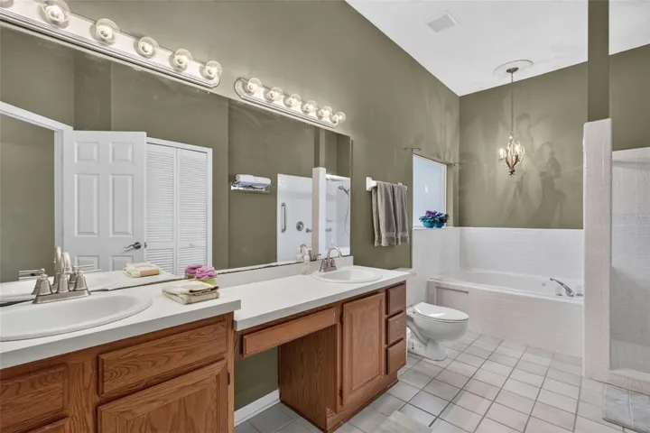 Dual vanities, new sinks, reglazed soaking tub & shower.