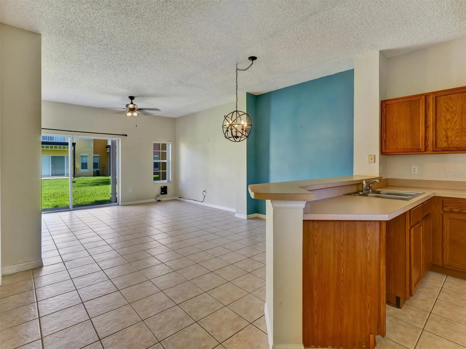 Kitchen with View of the Living &amp; Dining