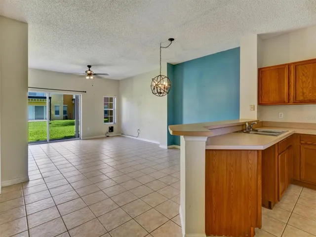 Kitchen with View of the Living &amp; Dining