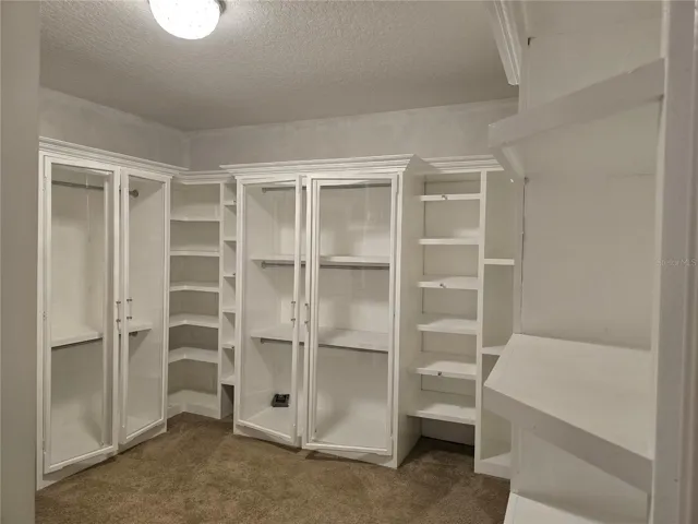 Bedroom 2 converted to a large walk in closet and dressing room.